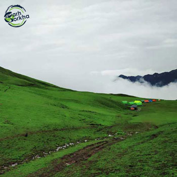 Captivating green sprawl of bedini bugyal with the glimpse of mt. Trishul from our first campsite